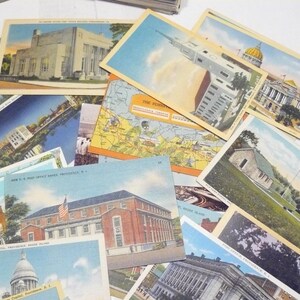 May include: A collection of vintage postcards featuring various buildings and landmarks. The postcards showcase architectural styles and include images of government buildings, churches, and maps. The color palette includes shades of blue, beige, and brown.