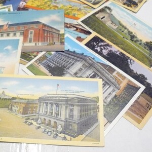 May include: A collection of vintage postcards featuring architectural landmarks. The postcards showcase buildings with detailed facades, including a post office and other structures. The color palette includes shades of beige, blue, and red.