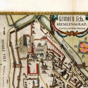 May include: An antique map of the Kremlin in Moscow, Russia. The map is hand-drawn and features detailed illustrations of the Kremlin walls, towers, and buildings. The map is titled "Kremlen Grad" and "Castellum Vrbis Moskve" in Latin. The map also includes a compass rose and a key.