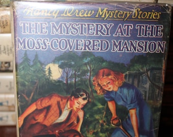 Livre vintage des années 40, « Le Mystère de Nancy Drew au Manoir Moussé », avec planches bleues, longue-vue orange et DJ.