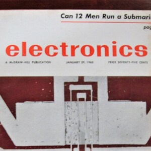 May include: A vintage magazine cover with the title "electronics" in large orange letters. The cover features the text "Can 12 Men Run a Submarine?" and "A McGraw-Hill Publication, January 25, 1960". The background has a geometric design in white and maroon.