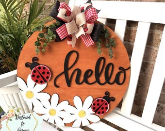 Letrero de bienvenida con forma de mariquita para colgar en la puerta