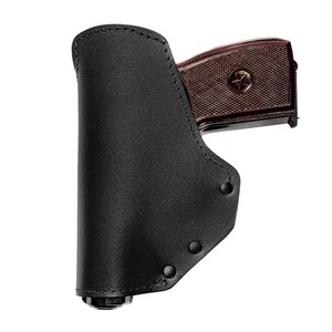 以下が含まれることがあります： 茶色の銃が入った黒い革製のホルスター。ホルスターはステッチが施され、スナップ留めになっています。