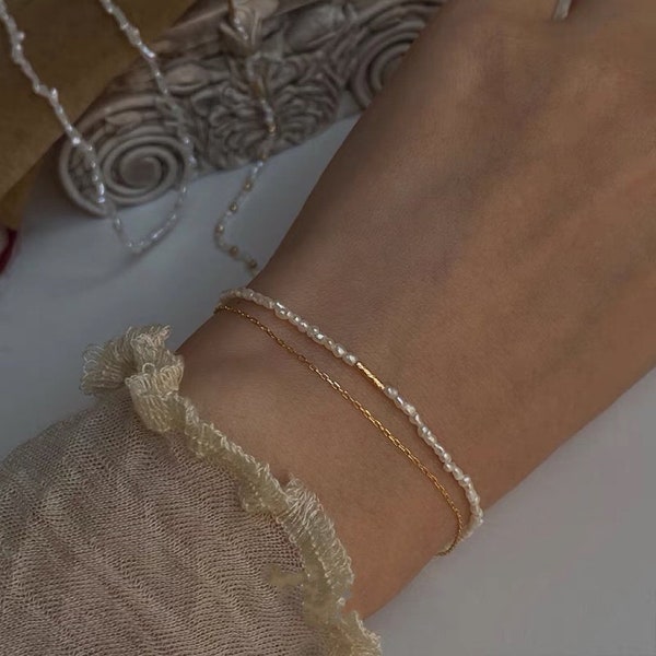 14K gold filled Layered tiny Genuine pearl elegant bracelet. stacking bracelet. dainty bracelet. minimalist bracelet. Gift for her.