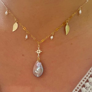 14K gold filled freshwater charm necklace. Multiple-chain necklace. Freshwater pearl necklace. Shell starfish leafs necklace.