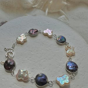Freshwater multiple-color baroque pearl bracelet. Boho pearl bracelet. June birthstone. High luster pearl butterfly bracelet. Sterling silve