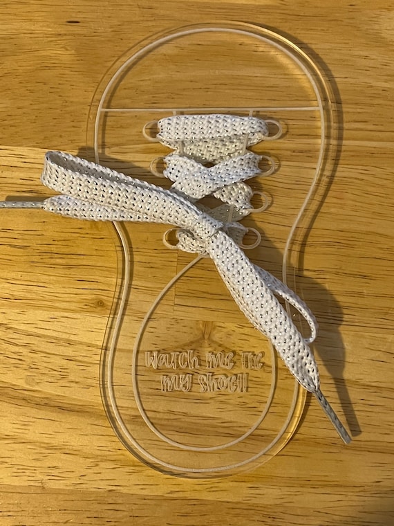 Shoe tying best sale tool