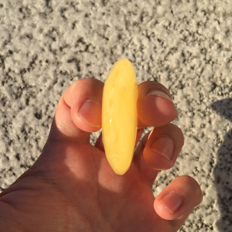 100/% Natural Baltic stone Premium quality 18.8gr Amber stone 4.81cm diameter Amber stone.