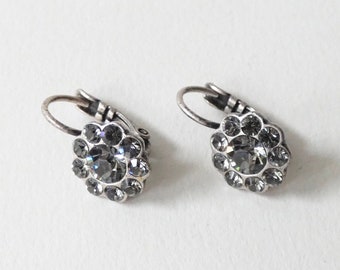 Vintage grey rhinestone cluster flower silver tone drop hoop earrings, rhinestone floral hoop dangle earrings, dark grey diamante earrings.