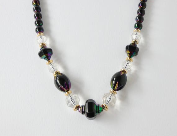 Vintage petrol clear bead statement necklace. Large, chunky, circular, gold, oval bead necklace. 1980 retro bead necklace.