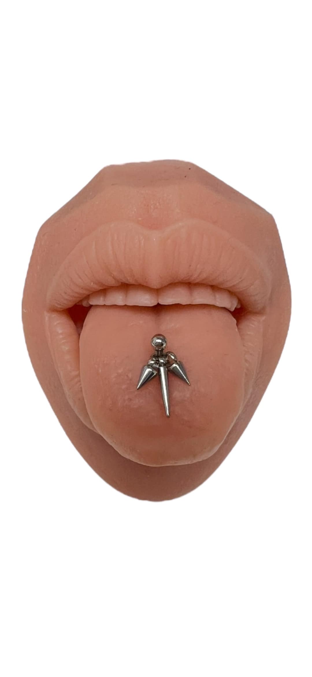 Tongue piercing , Tongue jewelry with spike