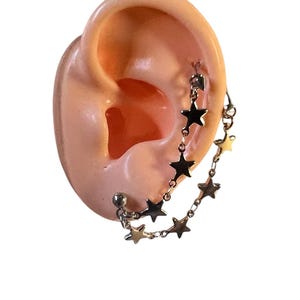 Helix piercing with stars