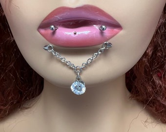 Demon horses shoe lips , with Zircon ,Vampire lips piercing , Snake piercing