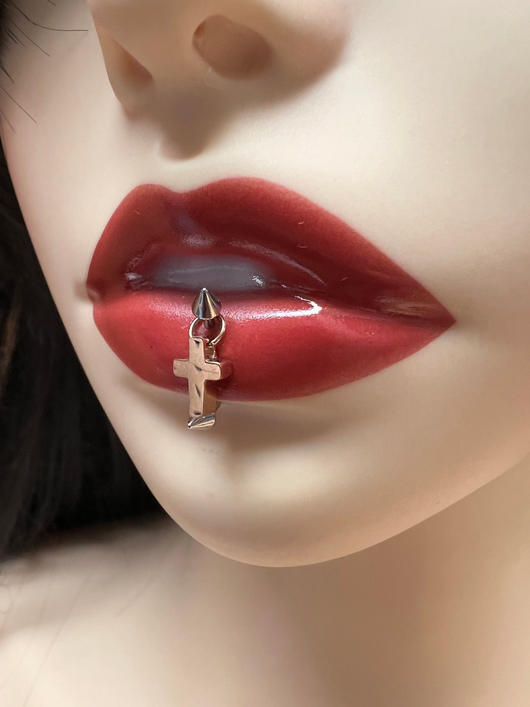 Cross lip piercing sale