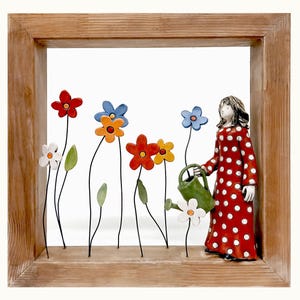 Girl in the Flower Garden – Ceramic Wall Sculpture in Wooden Frame, Girl Watering Colorful Flowers, Ready to Hang, Whimsical Wall Art