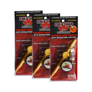 May include: Three packages of a red and gold Cold Snap Outdoors Toothpick Hook Remover with a retractable lanyard. The hook remover is made of yellow plastic and has a red and gold Cold Snap Outdoors logo on the side. The package says "New & Improved!" and "Patent Pending!"