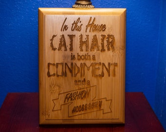 Bamboo wall hanging artwork. "In this House Cat Hair is both a Condiment and a Fashion Accessory". Pet Parent gift.