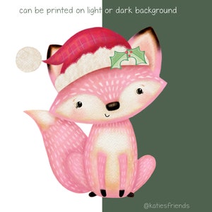 May include: A pink fox illustration wearing a red and white Santa hat with a sprig of holly. The text "can be printed on light or dark background" is at the top. The fox has a black nose and eyes, and the artist's name is at the bottom.