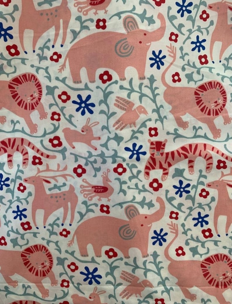 May include: White fabric with a repeating pattern of pink elephants, lions, tigers, deer, birds, and rabbits. The design includes red flowers, blue star-shaped flowers, and gray vines. The overall theme is a whimsical animal print.