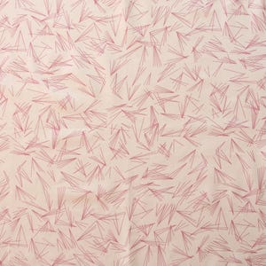 May include: A fabric with a repeating pattern of thin, pink lines arranged in a scattered, geometric design. The lines are of varying lengths and angles, creating a textured appearance against a light beige background. The overall effect is abstract and modern.