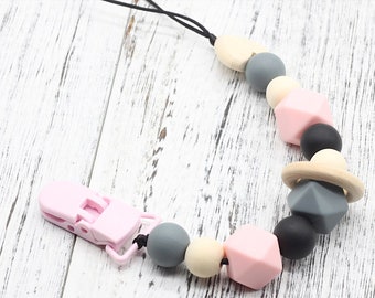 Pacifier clip in wood and silicone