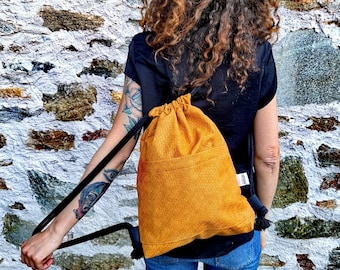 Vegan Leather Drawstring Utility Backpack with Gold Hardware, Adjustable Strap Avery Pebbled Drawstring Utility Backpack – Black | JW PEI main image 3