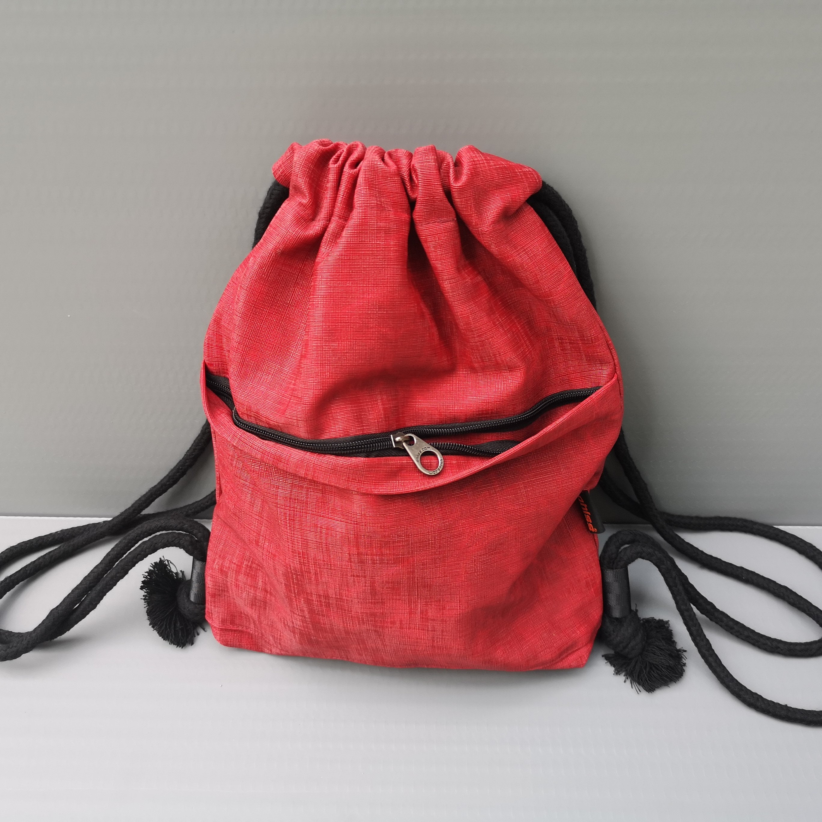 EUC IF Bags Italy Red Smooth Sustainable Vegan Eco-Leather Drawstring Backpack ÖLEND Ona Vegan Leather Cherry Red Bag | Shop at PUKAS SURF SHOP main image 3