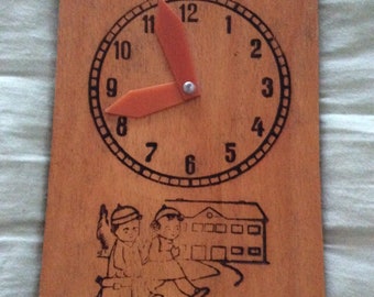 Wooden Tell the time clock