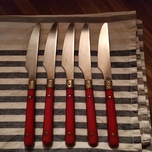 Red handled cutlery