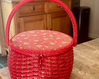 Red sewing basket.