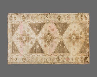 Vintage Turkish Area Rug 4x7: Handwoven Wool, Tribal Medallion Design