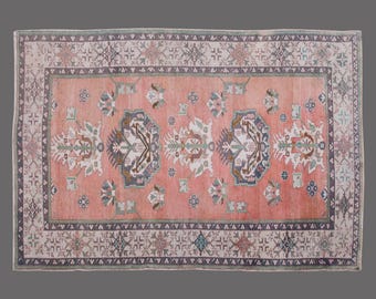 Vintage Turkish Rug 5x7: Handwoven Wool Carpet, Coral Pink Medallion