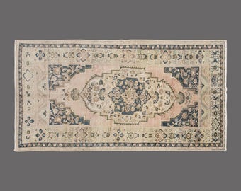 Vintage Turkish Rug: 5x9 Konya Wool Rug with Floral Medallion