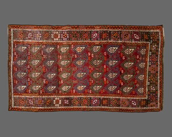 Vintage Turkish Rug: Handwoven Wool, Tribal Caravan Motifs, 3.7 x 6.5 ft