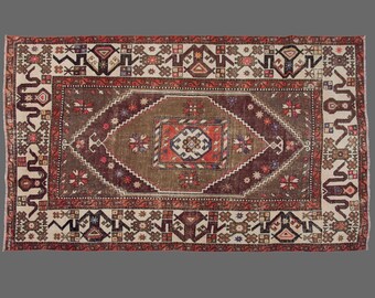 Vintage Turkish Rug: 5x8 Hand-Knotted Wool Tribal Medallion