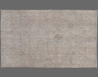 Faded Floral Oushak Rug: 6x10 Vintage Turkish Wool Rug