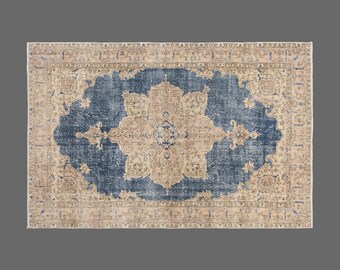 Vintage Handwoven Turkish Wool Rug: 1960s Bohemian Nomadic Design