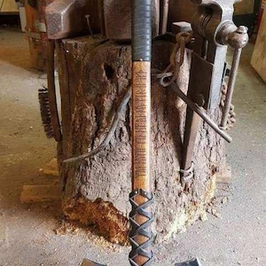 Hand-forged fantasy double-blade axe Atlantean Rage, with straight shaft, various leather wrappings and in different variants