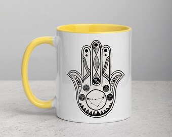 Capricorn Zodiac Sign Hamsa Hand of Protection Mug with Yellow, Black, Blue or Red inside.