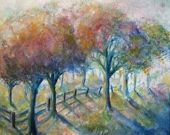 May include: A watercolor painting of a forest scene with trees and a wooden fence. The trees are painted in shades of pink, purple, blue, and green. The sky is a light blue with white clouds. The ground is covered in a field of small, red flowers.