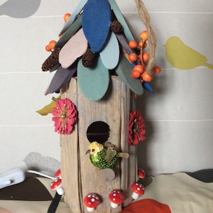 Small light up decorated bird house