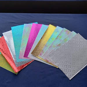 12 fogli di bellissima carta glitterata, tanti colori e disegni, fogli singoli disponibili blu, argento, oro, rosa bianco, giallo lucido
