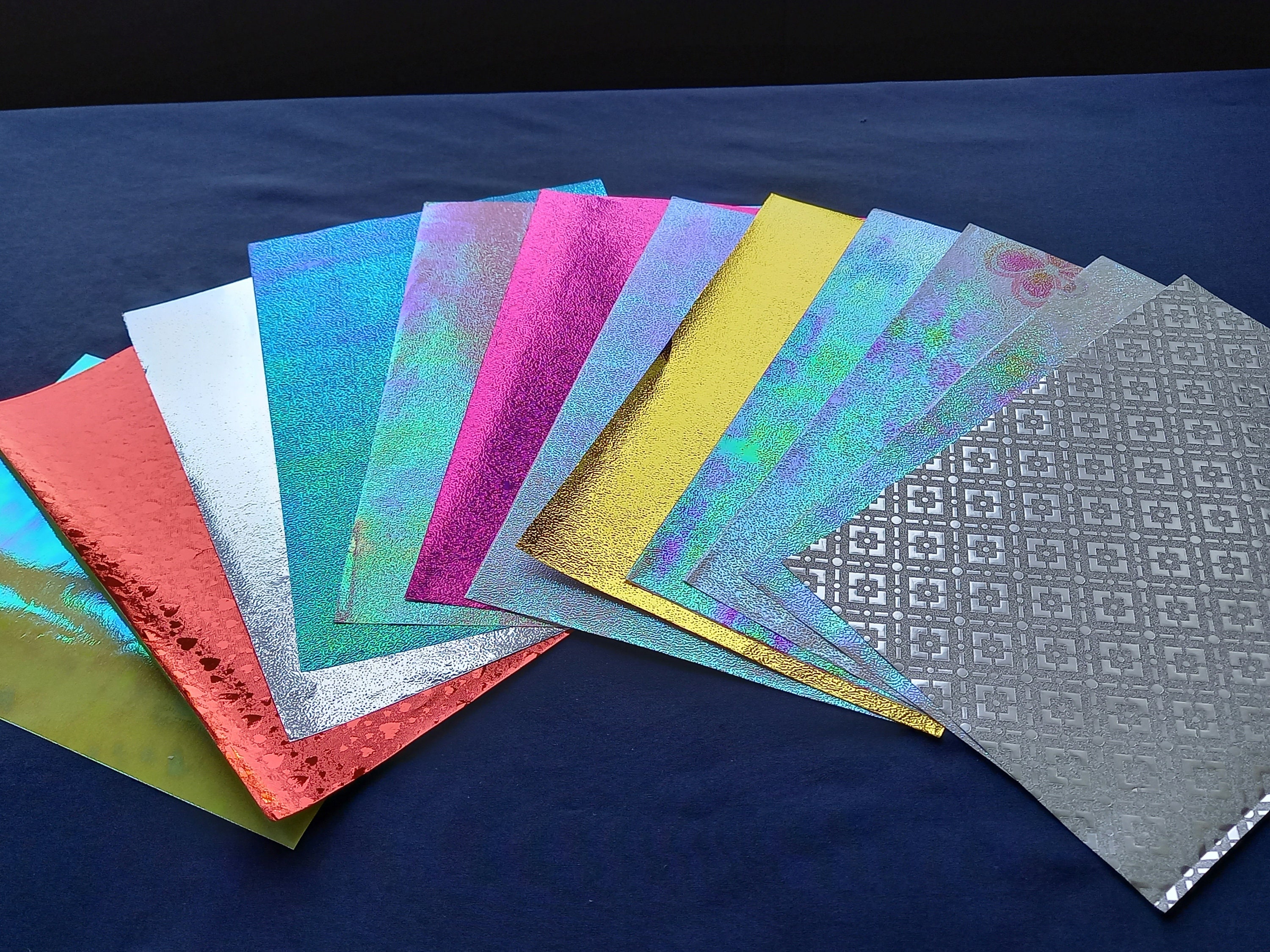 12 Sheets of Beautiful Glitter Paper, Lots of Colours and Designs