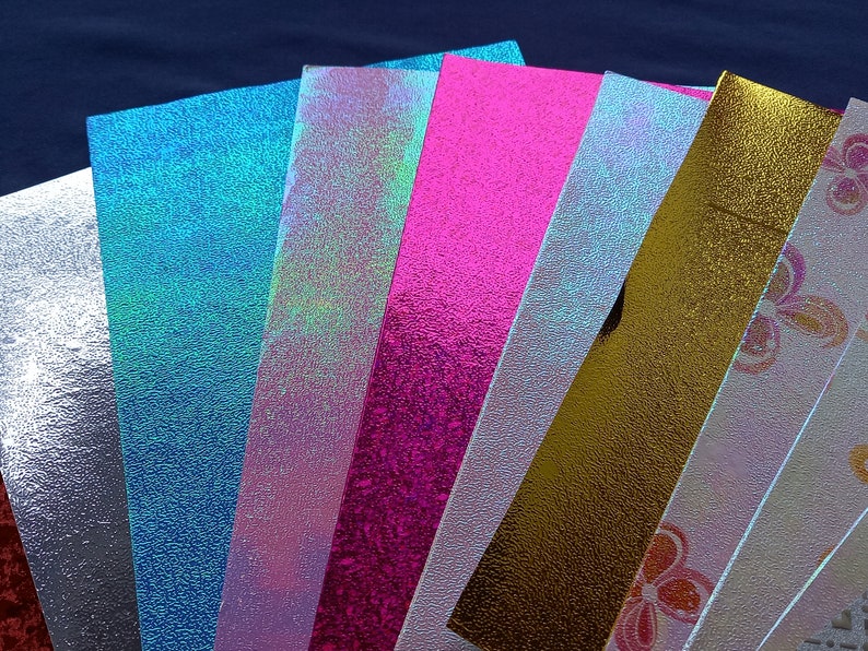 12 Sheets of Beautiful Glitter Paper, Lots of Colours and Designs