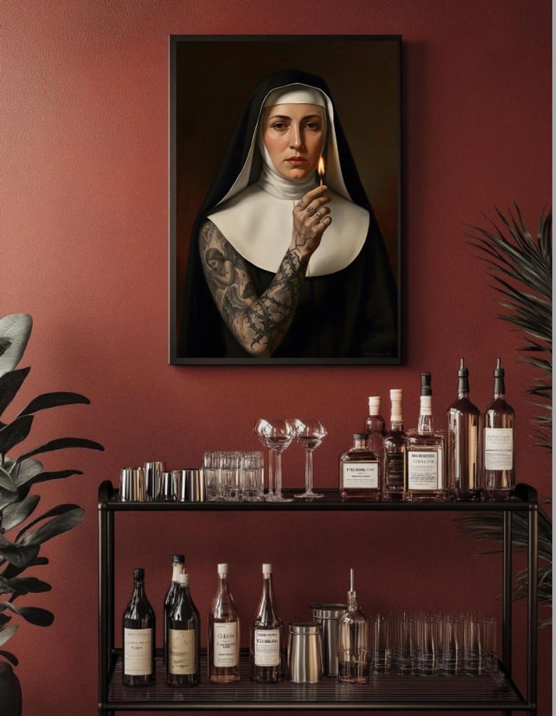 May include: A framed portrait of a nun holding a lit match, with a full sleeve tattoo. Below, a black metal bar cart displays various bottles of liquor, glassware, and bar tools against a red wall.