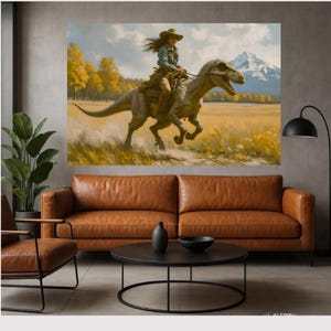 May include: A large canvas print depicts a person riding a dinosaur through a field. The person wears a cowboy hat and denim shirt. The dinosaur is gray and brown. The background features yellow trees, a mountain, and a blue sky. The print is displayed above a brown leather sofa.