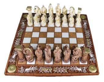 May include: A white and brown chess set with Greek mythology figures. The chessboard has a brown and white checkered pattern. The pieces are made of white and gold painted resin.