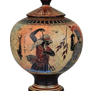May include: A ceramic Greek amphora with a lid, decorated with a scene of two figures in a sea setting. The figures are painted in red, black, and white, and the background is a light beige. The amphora is on a white background.