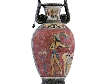 May include: A red and black ancient Greek vase with a painted scene of a person in a feathered hat holding a small object. The vase has two handles with a spiral design.