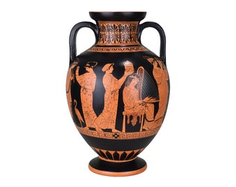 May include: A black and orange Greek amphora vase with two handles. The vase features detailed illustrations of figures in classical attire, with a geometric border design. The vase is a decorative piece.